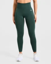 Empower Seamless Leggings – Dark Green Crafted from ultra‑soft, weightless nylon‑elastane fabric that molds to your shape for breathable, squat‑proof comfort, these leggings feature contour‑shading and a refined scrunch bum with a flattering mid‑rise fit for everyday performance 